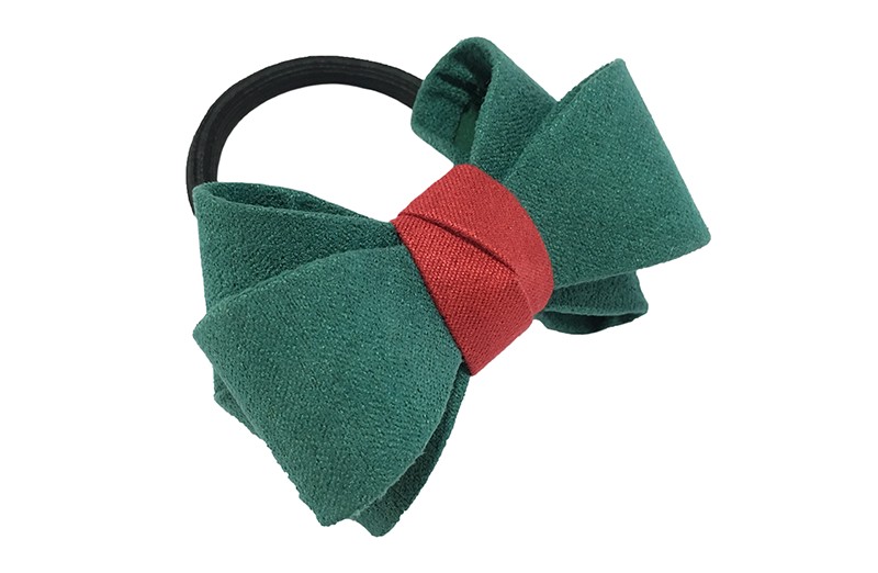 Mooie luxe groene haar elastiek met rood accent. Dubbel gestrikt van verstevigde stof. Leuk voor de iets grotere meisjes.