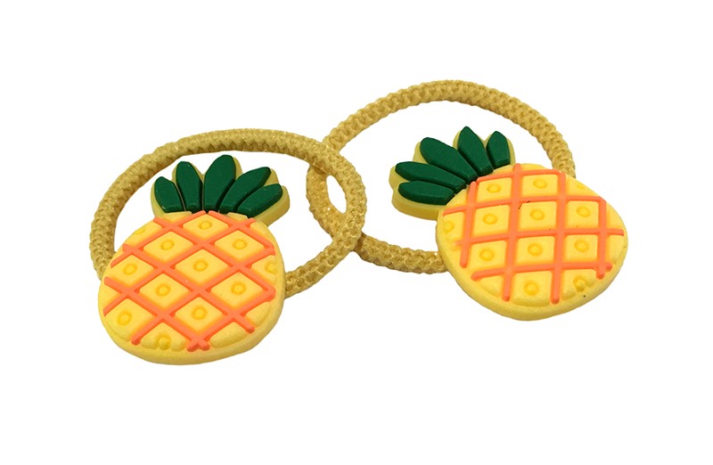 Vrolijk setje van 2 gele peuter kleuter meisjes haarelastiekjes. 
Met op elk een vrolijk ananas figuurtje.