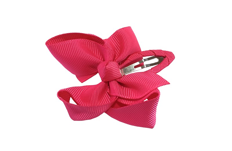 Vrolijk peuter kleuter haarspeldje bekleed met fuchsia roze lint. 
Met een fuchsia roze strikje van geribbeld lint. In een mooie dubbel geknoopte look. 