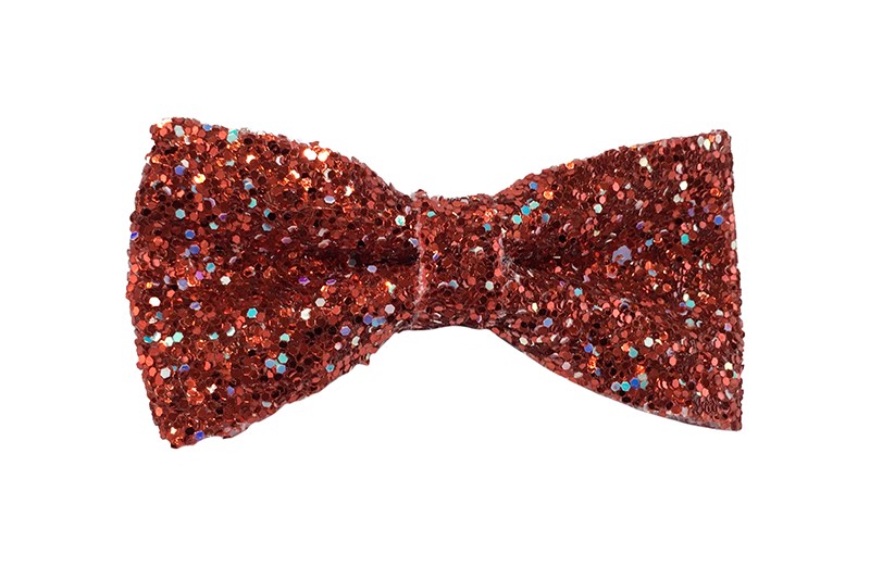 Vrolijke rode peuter, kleuter, meiden haarstrik vol met glittertjes. De glittertjes in groot en klein geven deze strik een extra glanzende look. Vastgemaakt op een handig haarknipje met kleine tandjes van 4 centimeter.