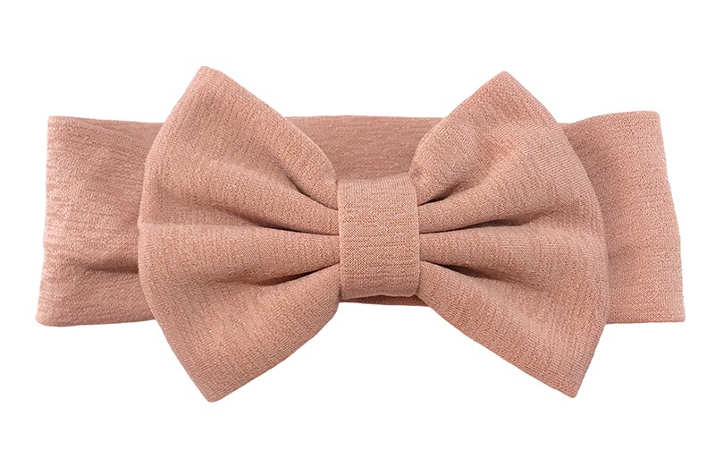 Vrolijke oud roze stoffen baby peuter meisjes haarband.
Van rekbare stof met een grote stoffen strik.
De strik is ongeveer 12 centimeter breed. 