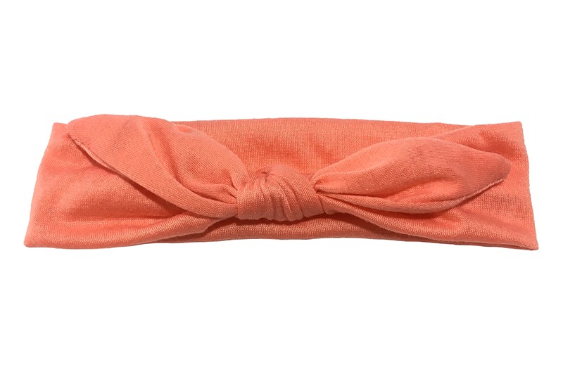 Lief effen zacht oranje/koraal roze baby peuter haarbandje van zachte rekbare stof. In een leuk modelletje geknoopt. 
Het haarbandje is ongeveer 5 centimeter breed. 