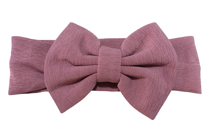 Vrolijke paars roze stoffen baby peuter meisjes haarband. Van rekbare stof met een grote stoffen strik.
De strik is ongeveer 12 centimeter breed. 